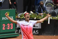 Italy's Lorenzo Sonego reacts after beating 3-6, 6-4, 6-3, Russia's Andrey Rublev during their quarter-final match at the Italian Open tennis tournament, in Rome, Saturday, May 15, 2021. (Fabrizio Corradetti/LaPresse via AP)