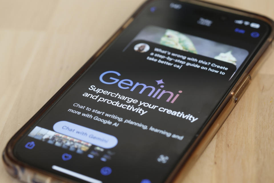 NEW YORK, NEW YORK - MARCH 18: In this photo, Gemini Ai is seen on a phone on March 18, 2024 in New York City.  Apple has announced that it is exploring a partnership with Google to license Gemini AI-driven features on iPhones with iOS updates later this year.  Google already has an agreement in place with Apple to be the top search engine provider on iPhones for the Safari browser.  (Photo Illustration by Michael M. Santiago/Getty Images)