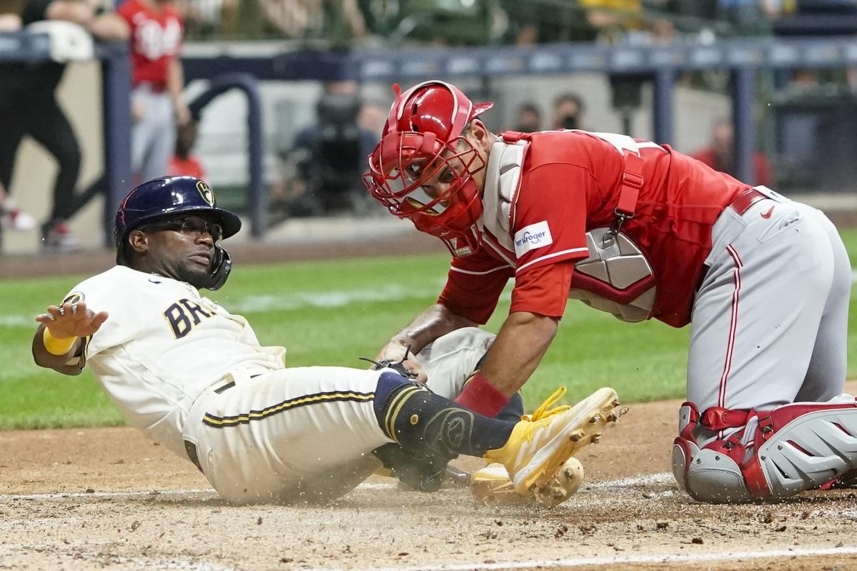 Tag at home plate caps Brewers' 4-3 victory over Pirates