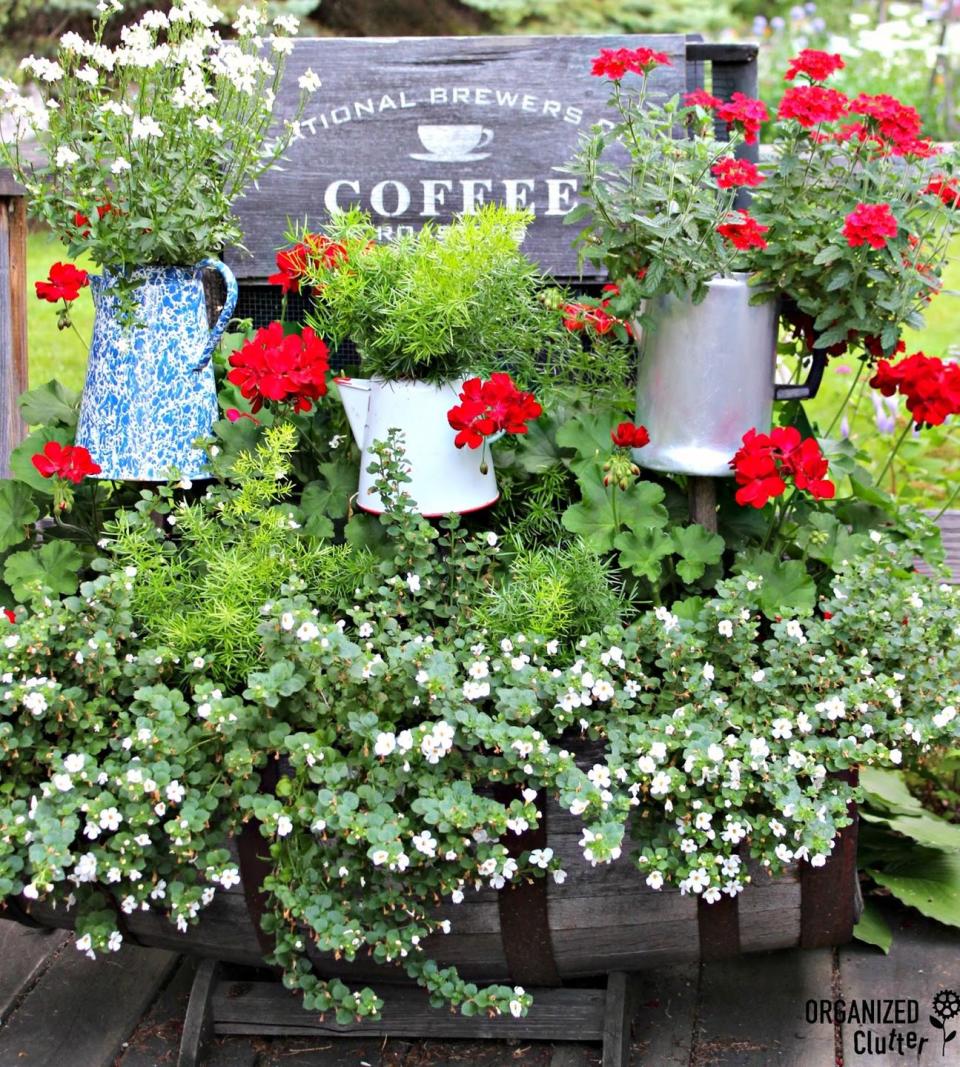 8) DIY Staked Coffee Pot Planters