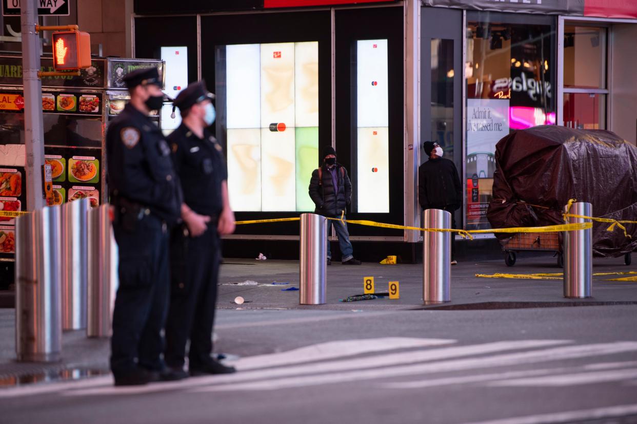 Evidence markers were also placed on the corner of 45th St. and 7th ave after innocent bystanders, were shot, Saturday in Times Square .