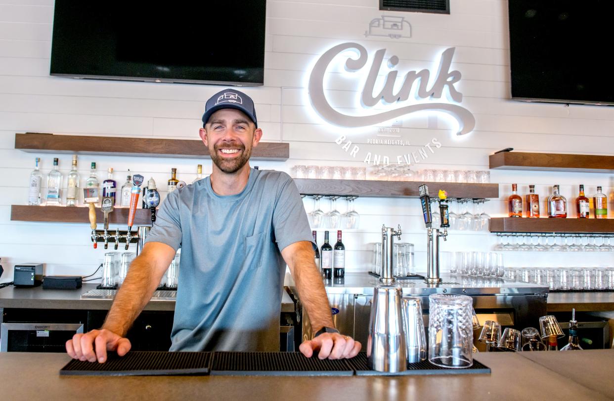 Owner Sam Heppard posed behind the bar at his new Peoria Heights tavern Clink Bar and Events above Brienzo's Pizza in Heritage Square. Clink is planning to open for business on Oct. 14.