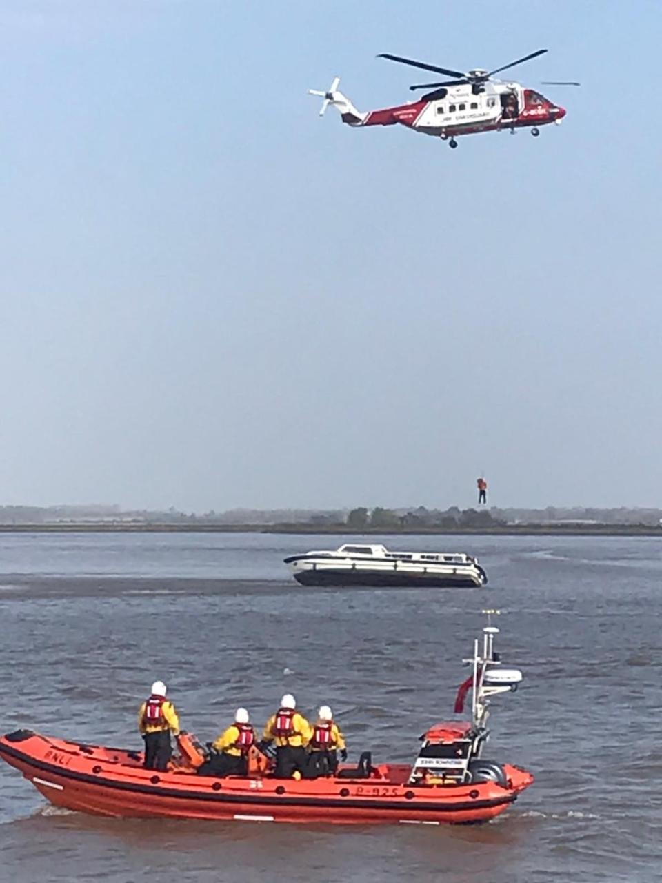 16 people, two dogs, and a rabbit were rescued by RNLI lifeboats, the Hemsby Lifeboat, and a Coastguard helicopter at Breydon Water, Norfolk on Sunday April 24 after being stranded over night. (credit: Great Yarmouth & Gorleston RNLI)