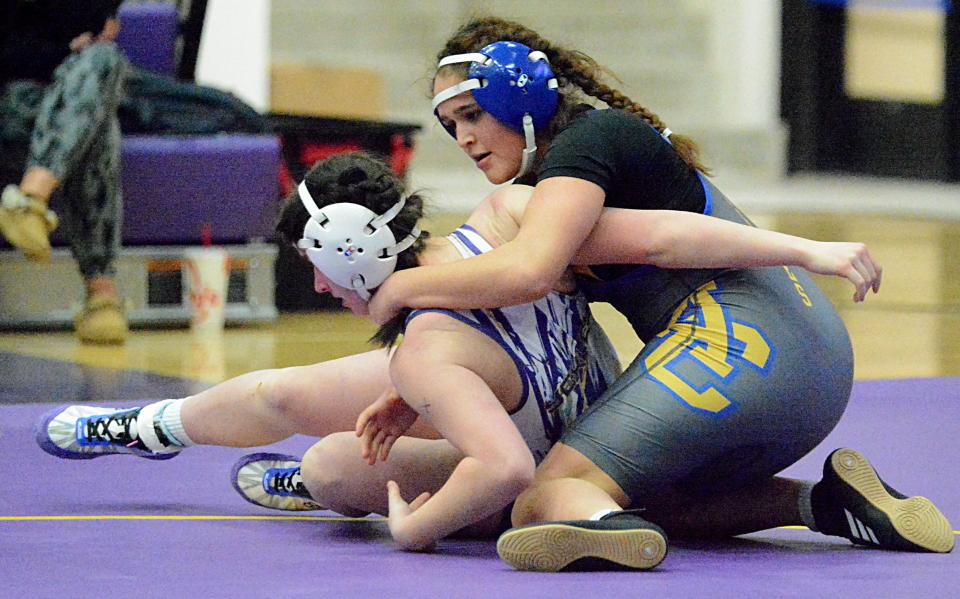 Aberdeen Central's Jasmine Maas battles Watertown's Katelyn Yexley at 132 pounds during an Eastern South Dakota Conference wrestling triangular on Thursday, Jan. 26, 2023 in the Watertown Civic Arena.