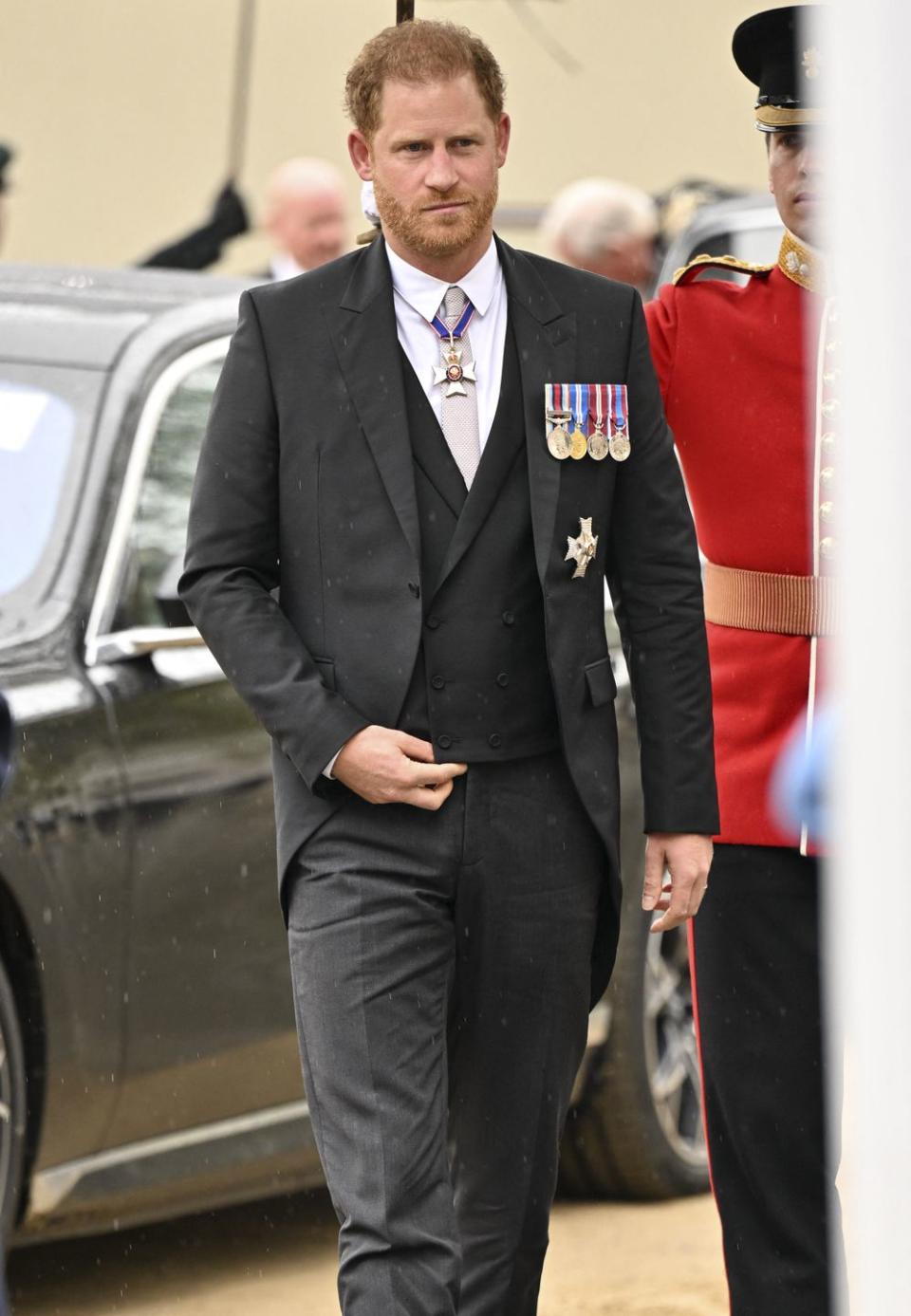 britains prince harry, duke of sussex arrives at westminster abbey in central london on may 6, 2023, ahead of the coronations of britains king charles iii and britains camilla, queen consort the set piece coronation is the first in britain in 70 years, and only the second in history to be televised charles will be the 40th reigning monarch to be crowned at the central london church since king william i in 1066 outside the uk, he is also king of 14 other commonwealth countries, including australia, canada and new zealand camilla, his second wife, will be crowned queen alongside him, and be known as queen camilla after the ceremony photo by andy stenning pool afp photo by andy stenningpoolafp via getty images