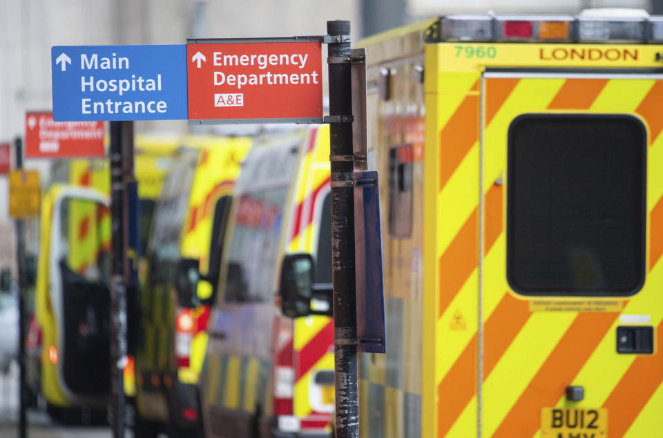 Ambulances outside the Royal London Hospital, in London, Tuesday Dec. 29, 2020. England Health Service figures show hospitals now have more Covid-19 patients than during April's first-wave peak, with fears of increased figures because of a Christmas social spread. (Dominic Lipinski/PA via AP)