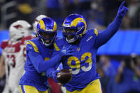 Los Angeles Rams defensive tackle Marquise Copeland (93) celebrates after intercepting a pass against the Arizona Cardinals during the first half of an NFL wild-card playoff football game in Inglewood, Calif., Monday, Jan. 17, 2022. (AP Photo/Mark J. Terrill)