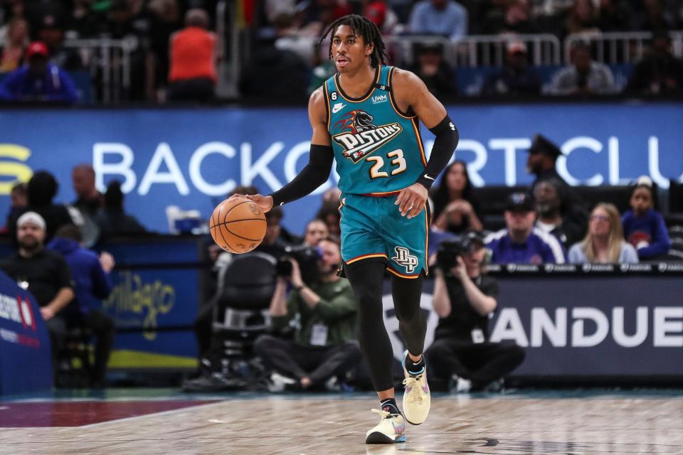 Pistons guard Jaden Ivey dribbles against Nets during the first half on Wednesday, April 5, 2023, at Little Caesars Arena.