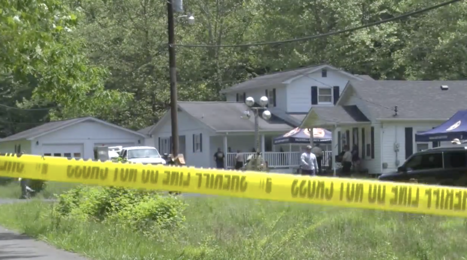 Investigators shown at Carini's home following the incident. Source: wvnstv
