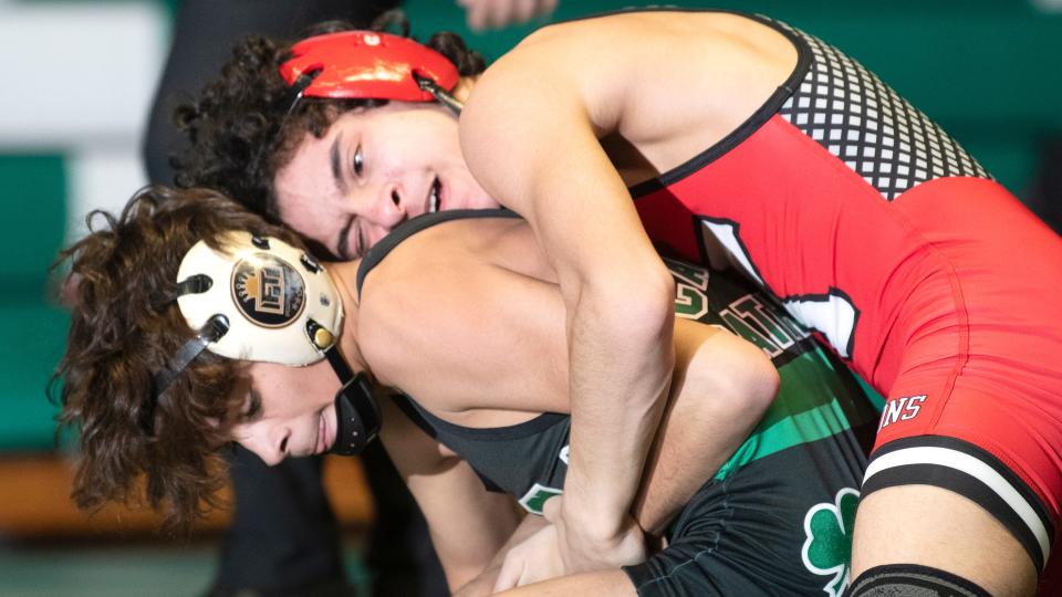 Kingsway's Jason Meola, top, controls Camden Catholic's Lazarus Joyce during the 106 lb. bout of the wrestling meet held at Camden Catholic High School in Cherry Hill on Friday, January 27, 2023.   Meola defeated Joyce, 8-5.  