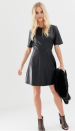 <p>This faux-leather mini shift dress from ASOS is nearly identical to Eugenie! For the price tag, this leather-look dress won’t break the bank, and with ASOS offering free standard delivery internationally,* you can save your dollars and treat yourself to a night out to show off your new look.<br><a rel="nofollow noopener" href="https://www.asos.com/asos-design/asos-design-pu-mini-shift-dress/prd/10775354?browseCountry=CA&browseCurrency=CAD&xaffid=10607&r=1" target="_blank" data-ylk="slk:SHOP IT- ASOS $79.95;elm:context_link;itc:0;sec:content-canvas" class="link ">SHOP IT- ASOS $79.95</a><br>*Some conditions apply </p>