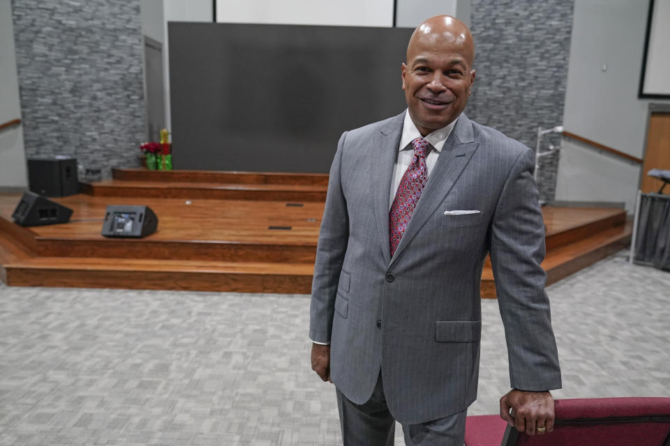 Pastor James Jackson, the lead pastor of Fervent Prayer Church, stands in the sanctuary at the church, Friday, Dec. 23, 2022, in Indianapolis. Jackson is running for mayor of Indianapolis. (AP Photo/Darron Cummings)