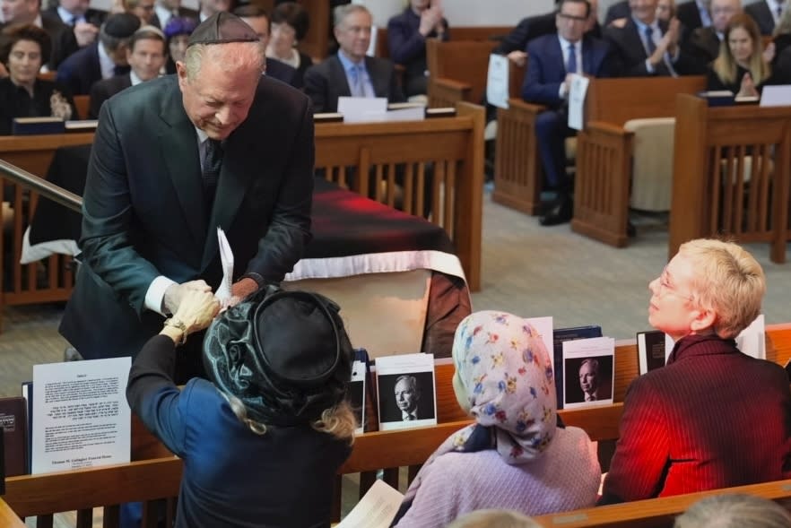 Former Vice President Al Gore offers his condolences to Hadassah Lieberman during the funeral for her husband, former Sen. Joe Lieberman in Stamford, Conn., Friday, March. 29, 2024. (AP Photo/Bryan Woolston)