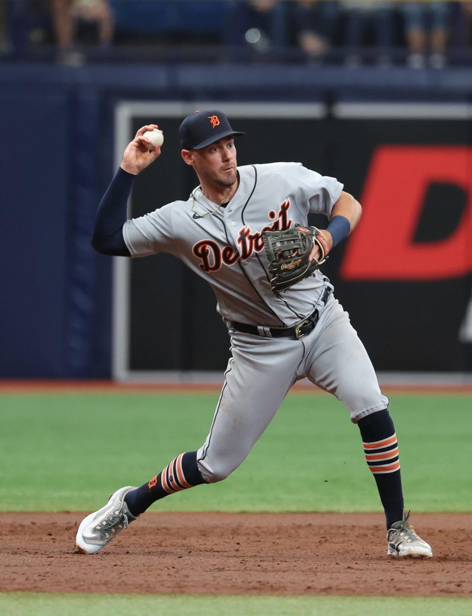 Tigers third baseman Ryan Kreidler throws the ball to first base for an out against the Rays during the second inning of the Tigers' 4-0 loss on Thursday, March 30, 2023, in St. Petersburg, Florida.