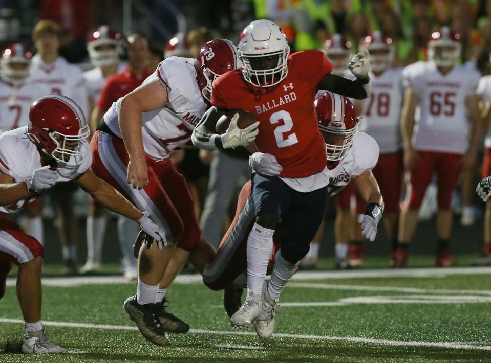 Ballard's wide receiver Jude Gibson (2) runs for a first down after making a catch against Dallas Center-Grimes during the first quarter in the Iowa high school week-4 game at Ballard High School football field Friday, Sept. 15, 2023, in Huxley, Iowa.