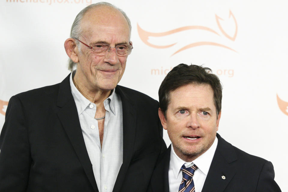 Christopher Lloyd, left, and Michael J. Fox, right, attend the Michael J. Fox Foundation 2018 benefit gala at the New York Hilton Midtown on Saturday, Nov. 10, 2018, in New York. (Photo by Andy Kropa/Invision/AP)