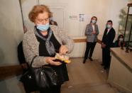 Georgia's Prime Minister Gakharia visits a polling station during a parliamentary election in Tbilisi