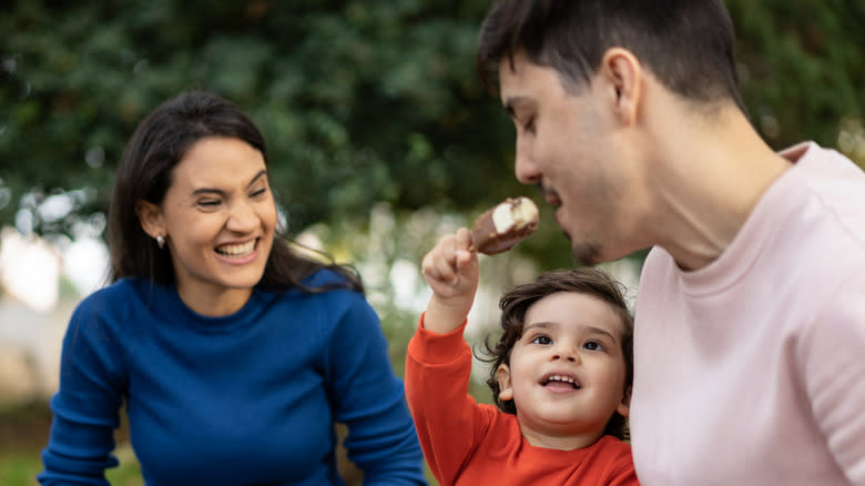 Family sharing an ice cream bar