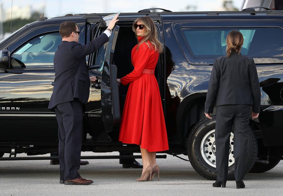 Photos: Getty. The First Lady pays homage to her predecessors in a coatdress.