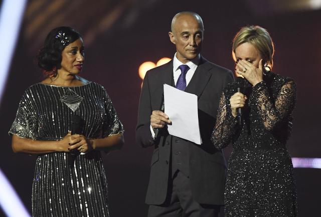 Wham band members Andrew Ridgeley, Pepsi and Shirley pay tribute to George Michael at the Brit Awards at the O2 Arena in London, Britain, February 22, 2017. REUTERS/Toby Melville