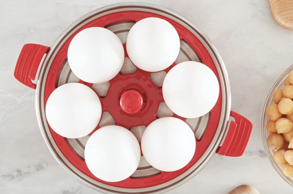 The DASH Rapid Egg Cooker holds six eggs.