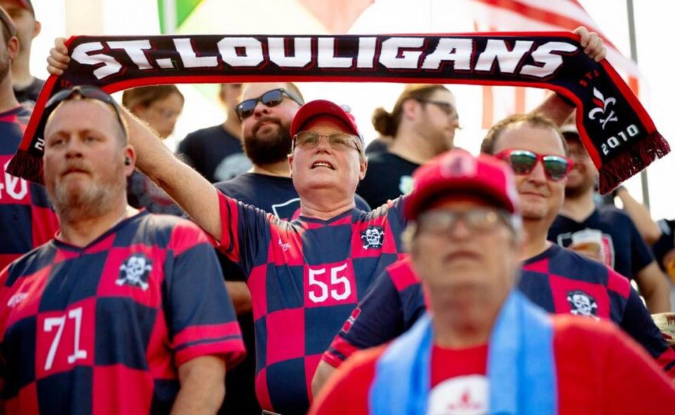 Bob Delaney, a 55-year-old St. Louis City 2 fan, hoists up a St. Louigans scarf on Aug. 6 during a matchup against Chicago Fire 2 at Ralph Korte Stadium in Edwardsville.