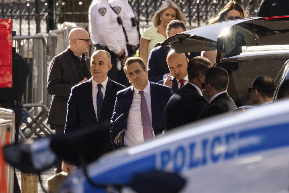 Todd Blanche, center, attorney for former President Donald Trump, arrives at Manhattan criminal court, Tuesday, April 16, 2024, in New York. Trump is set to return to court as a judge works to find a panel of jurors who'll decide whether the former president is guilty of criminal charges alleging he falsified business records to cover up a sex scandal during the 2016 campaign. (AP Photo/Yuki Iwamura)