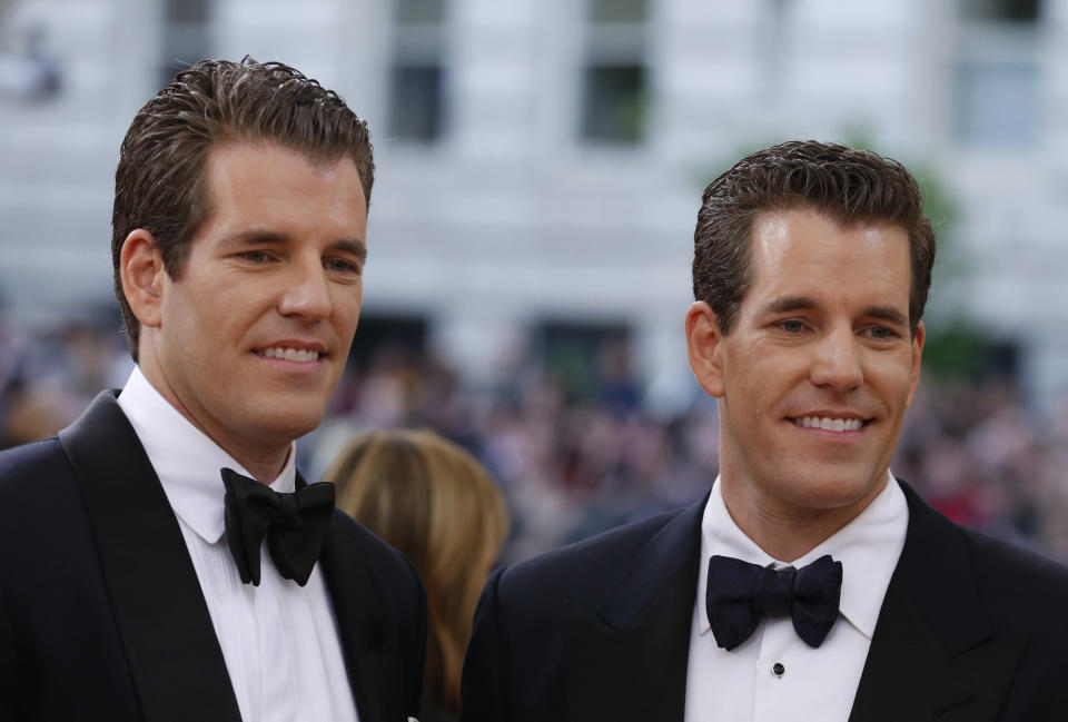 Entrepeneurs Tyler and Cameron Winklevoss arrive at the Metropolitan Museum of Art Costume Institute Gala (Met Gala) to celebrate the opening of "Manus x Machina: Fashion in an Age of Technology" in the Manhattan borough of New York, May 2, 2016. REUTERS/Lucas Jackson