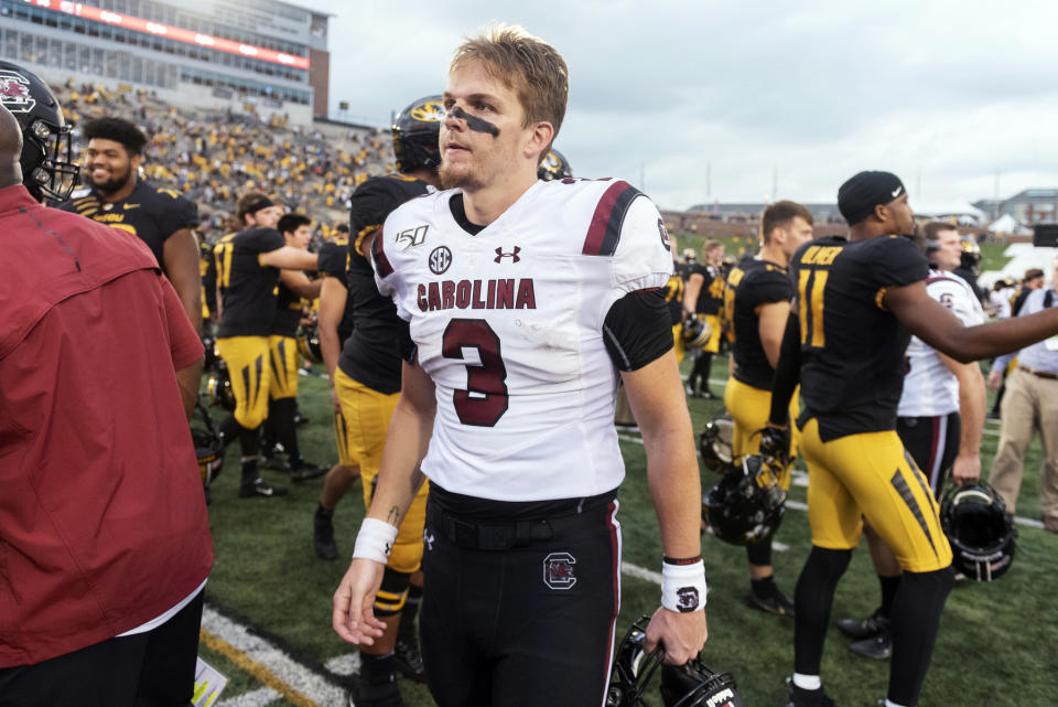 South Carolina starting quarterback Ryan Hilinski walks off the field after his team was beaten 34-14 by Missouri in an NCAA college football game, Saturday, Sept. 21, 2019, in Columbia, Mo. (AP Photo/L.G. Patterson)