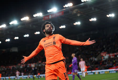 Soccer Football - Premier League - Stoke City vs Liverpool - bet365 Stadium, Stoke-on-Trent, Britain - November 29, 2017 Liverpool's Mohamed Salah celebrates scoring their third goal REUTERS/Eddie Keogh