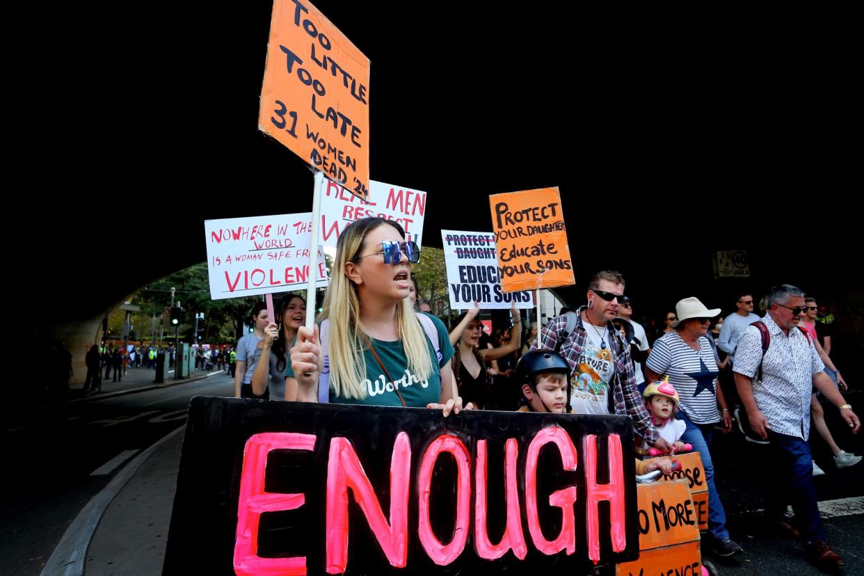 <span>Protesters take part in a rally against violence towards women in Sydney. Other rallies were held in Hobart and Adelaide on Saturday.</span><span>Photograph: Lisa Maree Williams/Getty Images</span>