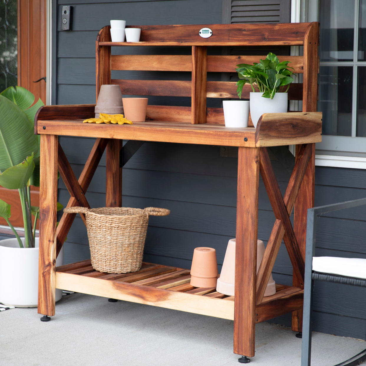 <p><a href="https://go.redirectingat.com?id=74968X1596630&url=https%3A%2F%2Fwww.walmart.com%2Fip%2FBackyard-Discovery-Acacia-Potting-Table%2F1801613556&sref=https%3A%2F%2Fwww.thepioneerwoman.com%2Fhome-lifestyle%2Fentertaining%2Fg43853952%2Fbest-walmart-patio-furniture%2F" rel="nofollow noopener" target="_blank" data-ylk="slk:Shop Now;elm:context_link;itc:0;sec:content-canvas" class="link rapid-noclick-resp">Shop Now</a></p><p>Backyard Discovery Acacia Potting Table</p><p>walmart.com</p><p>$249.00</p><span class="copyright">Walmart</span>