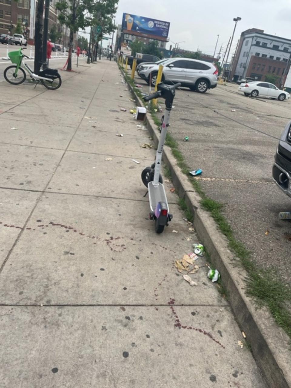 Trails of blood remained visible Tuesday morning after an overnight shooting left ten people injured, including one suspect and several innocent bystanders, in downtown Denver (Sheila Flynn)