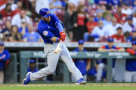 Chicago Cubs' David Bote hits a two-run double during the sixth inning of the team's baseball game against the Cincinnati Reds in Cincinnati, Wednesday, Oct. 5, 2022. (AP Photo/Aaron Doster)