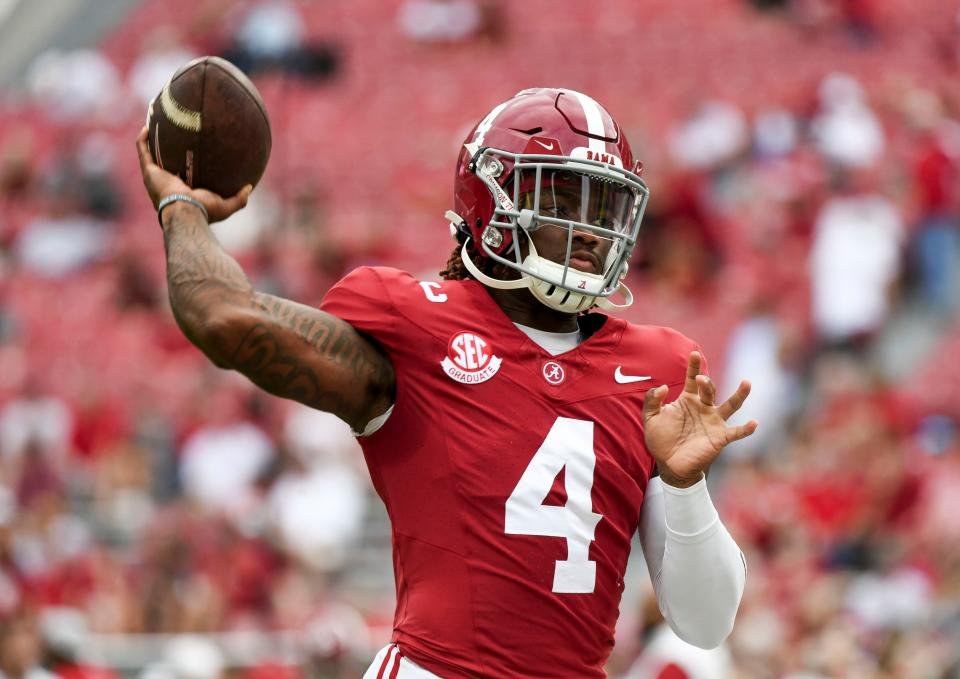 Sep 7, 2024; Tuscaloosa, Alabama, USA; Alabama Crimson Tide quarterback Jalen Milroe (4) throws during pregame warmups before a game against the South Florida Bulls at Bryant-Denny Stadium. Mandatory Credit: Gary Cosby Jr.-Imagn Images