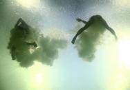 2016 Rio Olympics - Diving - Final - Women's Synchronised 10m Platform - Maria Lenk Aquatics Centre - Rio de Janeiro, Brazil - 09/08/2016. Liu Huixia (CHN) of China and Chen Ruolin (CHN) of China compete. REUTERS/Michael Dalder FOR EDITORIAL USE ONLY. NOT FOR SALE FOR MARKETING OR ADVERTISING CAMPAIGNS.