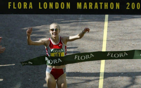 Paula Radcliffe crosses the line at the 2003 London Marathon - Credit: Russell Cheyne