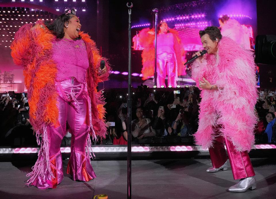 Lizzo and Harry Styles perform on the Coachella stage during the 2022 Coachella Valley Music And Arts Festival on April 22, 2022 in Indio, California