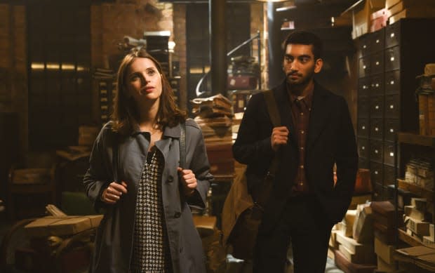 Ellie (Felicity Jones), in Jennifer-reminiscent houndstooth and '60s Burberry jacket, and Rory (Nabhaan Rizwan).<p>Photo: Parisa Taghizadeh/Courtesy of Netflix</p>