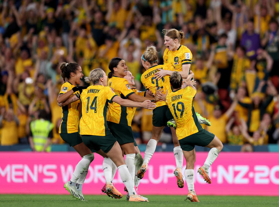 Matildas players celebrate their side's victory in the penalty shoot-out against France.