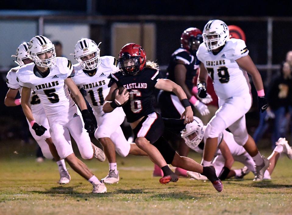 Eastland wide receiver Judson Beard outruns the Comanche defense during Friday's game in Eastland Oct. 15.