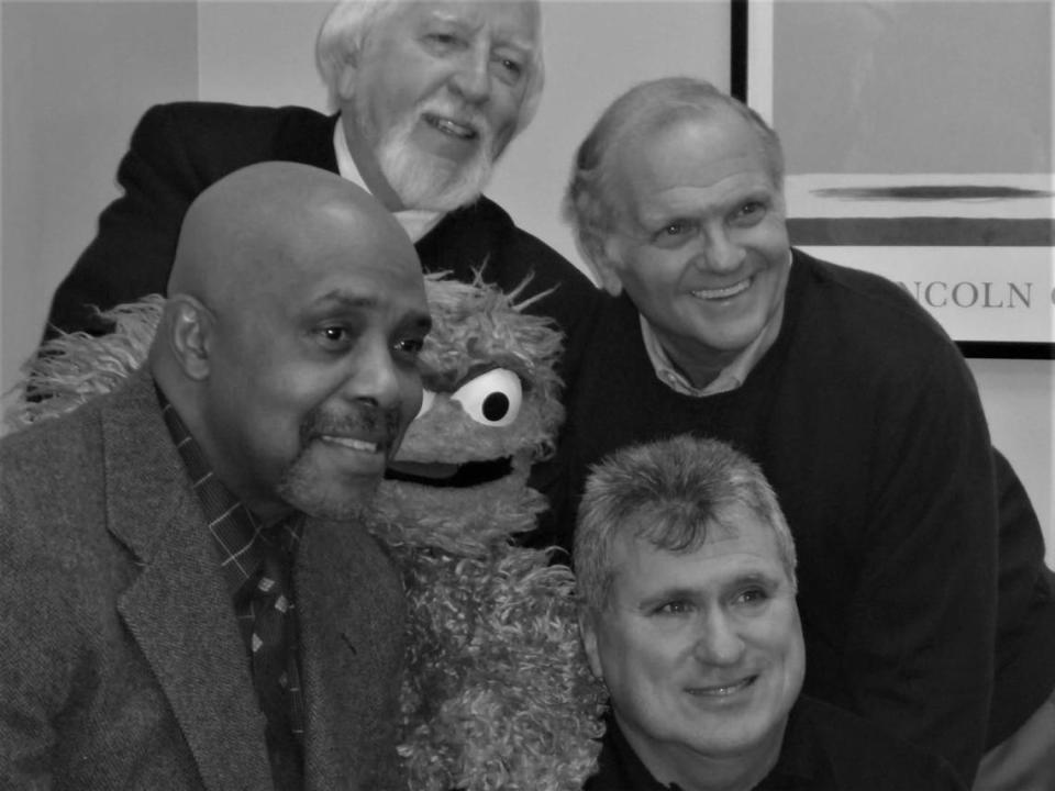 Michael Davis (bottom right), photographed in 2019 at the Barnes & Noble bookstore near Lincoln Center Manhattan with Carroll Spinney (top left); “Sesame Street” composer Christopher Cerf (top right); Roscoe Orman (who played Gordon on “Sesame Street” for more than four decades); and Oscar the Grouch.