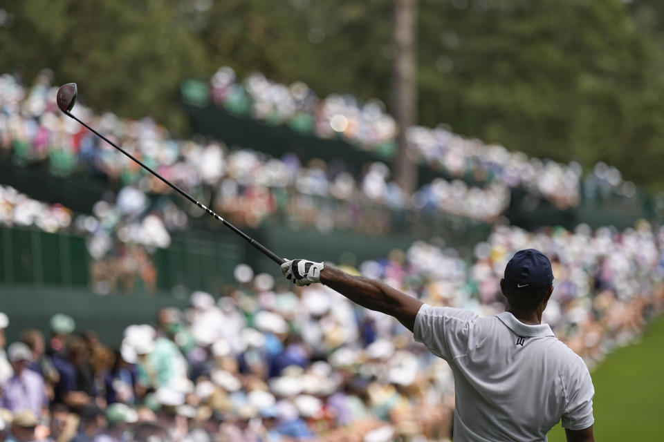 Tiger Woods reacts to his tee shot on the 14th hole during the first round of the Masters golf tournament at Augusta National Golf Club on Thursday, April 6, 2023, in Augusta, Ga. (AP Photo/David J. Phillip)