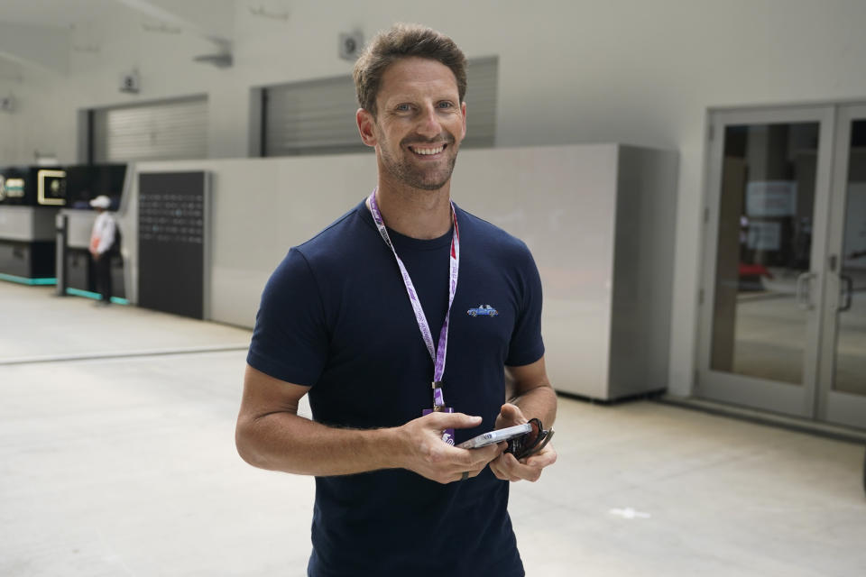 Former Formula One driver Romain Grosjean arrives at Miami International Autodrome for the Formula One Miami Grand Prix auto race, Thursday, May 5, 2022, in Miami Gardens, Fla. (AP Photo/Darron Cummings)