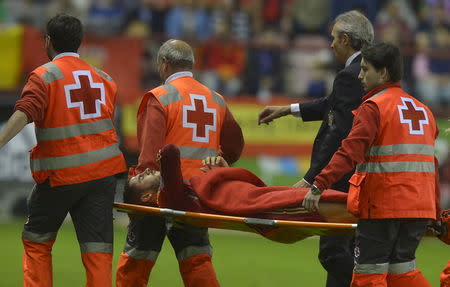 Spain's Alvaro Morata is led off on a stretcher after being injured during their Euro 2016 Group C qualification soccer match against Luxembourg in Logrono, Spain October 9, 2015. REUTERS/Vincent West