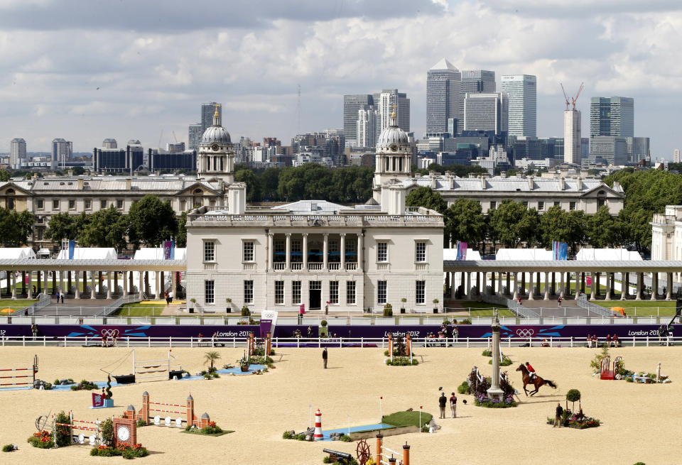 Mexico's Alberto Michan rides Rosalia La Silla during the equestrian individual jumping third qualifier in Greenwich Park at the London 2012 Olympic Games August 6, 2012. REUTERS/Mike Hutchings (BRITAIN - Tags: SPORT EQUESTRIANISM OLYMPICS) 