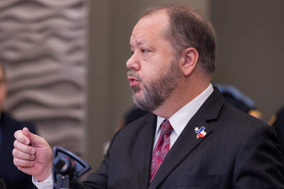 District Attorney Bill Hicks joins El Paso FBI and other law enforcement agencies as they discuss school threats at a news conference at the El Paso Regional Communications Center on Feb. 21.