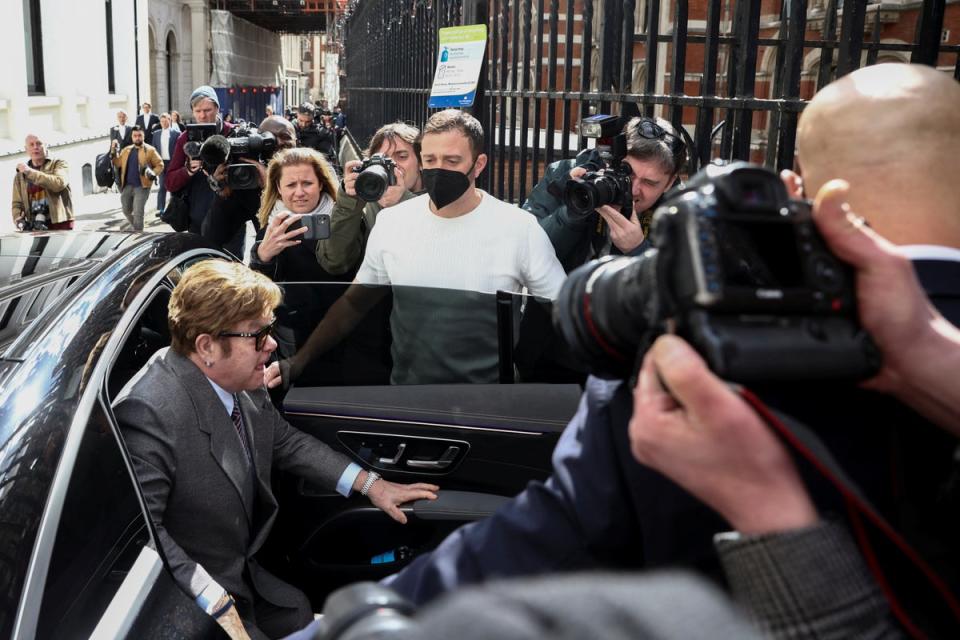 Elton John arrives at the High Court in London (Reuters)
