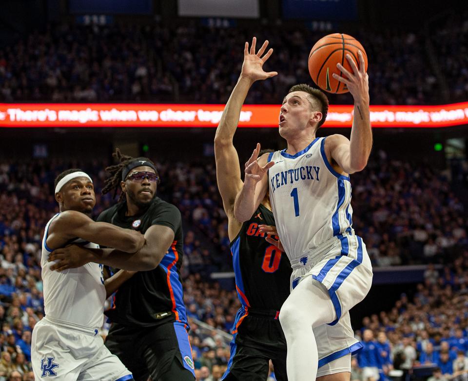 Kentucky guard CJ Fredrick (1) drove to the basket as the Wildcats faced off against Florida in Rupp Arena on Saturday evening. Kentucky defeated Florida 72-67. Feb. 4, 2023