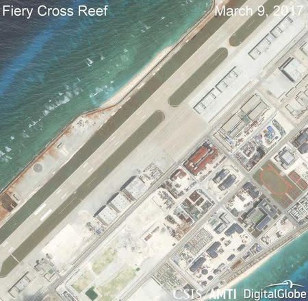 Construction is shown on Fiery Cross, in the Spratly Islands, the disputed South China Sea in this March 9, 2017 satellite image released by CSIS Asia Maritime Transparency Initiative at the Center for Strategic and International Studies (CSIS) to Reuters on March 27, 2017. Mandatory Credit: CSIS/AMTI DigitalGlobe/Handout via REUTERS